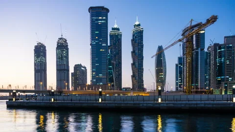 Sunset till night panoramic view of Business bay, reflection of the lights in 스톡 동영상 87475677