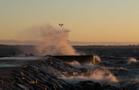 Sunset time and storm at the baltic sea Stock Photos