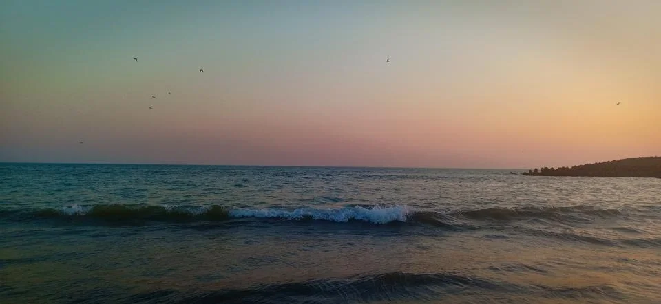 Sunset time at the beach Stock Photos