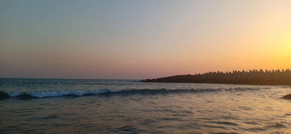 Sunset time at the beach Stock Photos