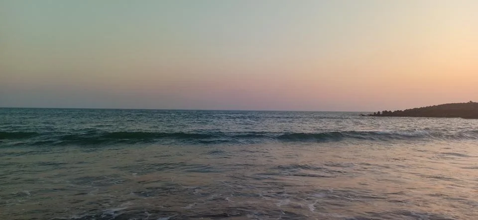 Sunset time at the beach Stock Photos
