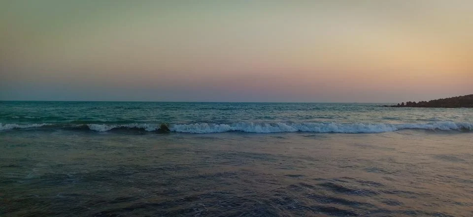 Sunset time at the beach Stock Photos