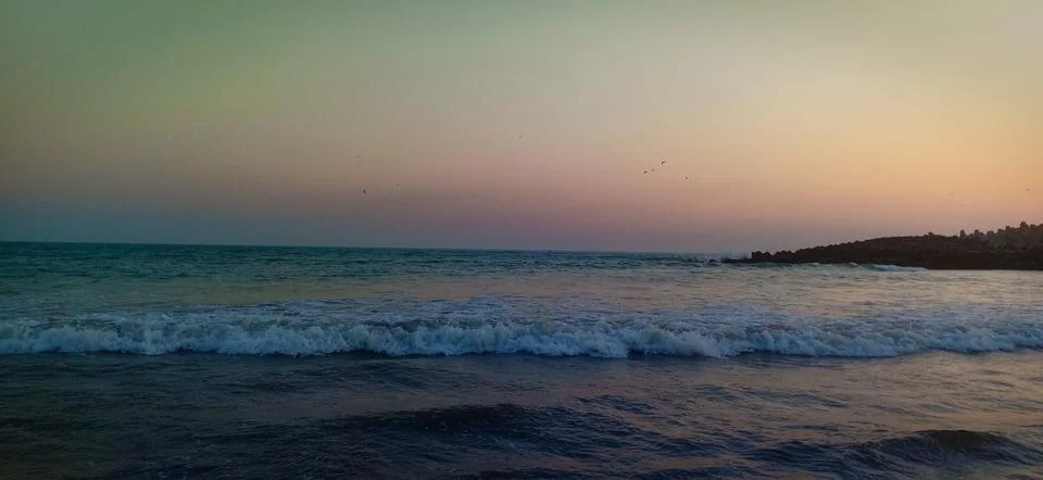 Sunset time at the beach Stock Photos