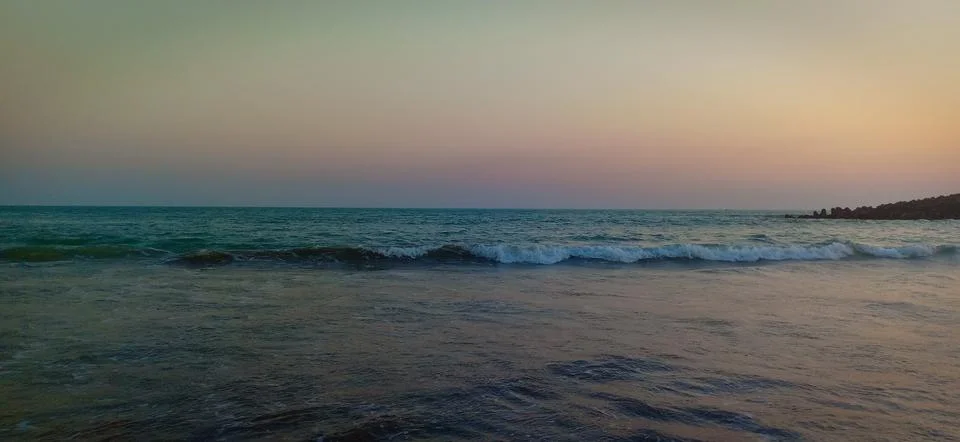 Sunset time at the beach Stock Photos
