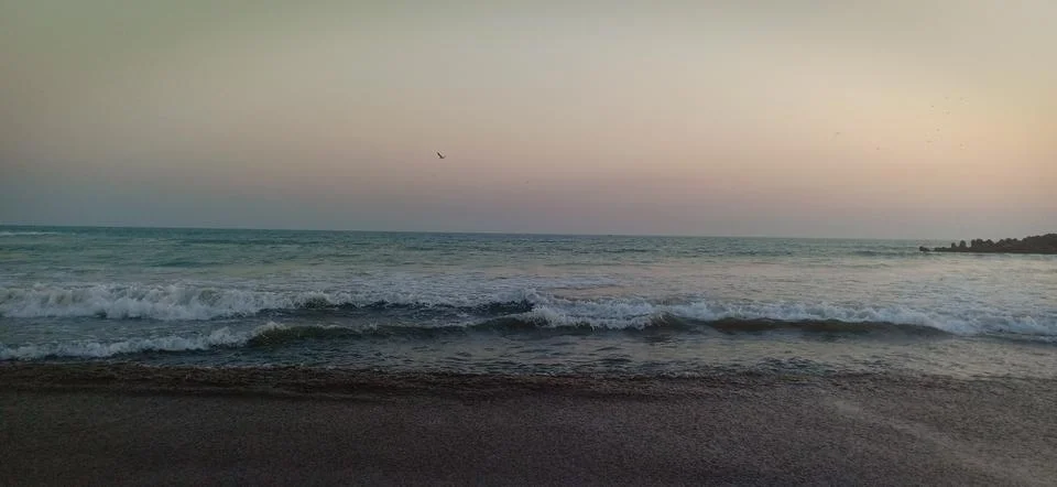 Sunset time at the beach Stock Photos