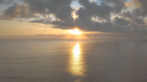 Sunset time with the beautiful reflection in the water aerial footage Stock Footage 100612129