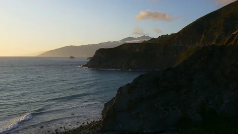Sunset time california big sur ocean bay hill panorama 4k usa Stock Footage 72398019