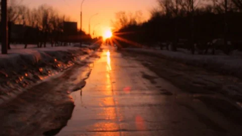 Sunset time at the city. Spring winter time, wet road 스톡 동영상 74434382