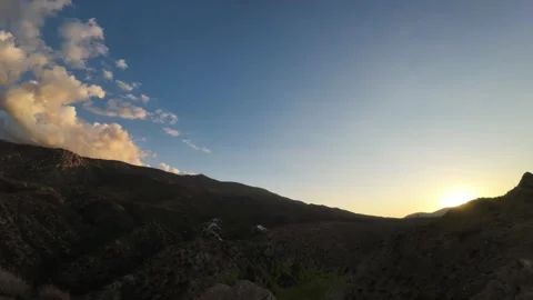 Sunset time laps over the hills 動画素材 344703410