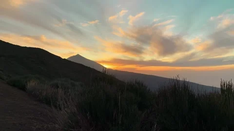 Sunset time lapse  against Teide volcano silhouette Stock Footage 314547750