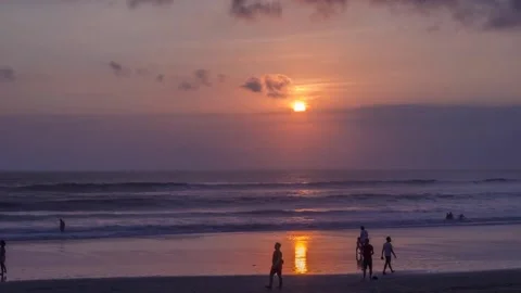 Sunset time lapse from the beach over the ocean's horizon Stock Footage 222711471