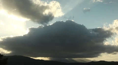 Sunset Time lapse, beautiful sun rays through clouds, big storm cloud Stock Footage 44943306
