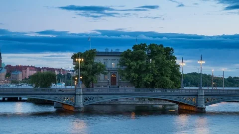 Sunset time lapse of bridge traffic in Gamla Stan island in Stockholm, Sweden Stock Footage 96061766