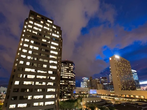 Sunset Time Lapse of Buildings and Clouds Stock-Footage 77583347