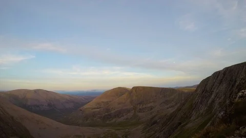 Sunset time lapse in the Cairngorms with the Munros Cairn Toul, Sgòr an Stock Footage 107760070