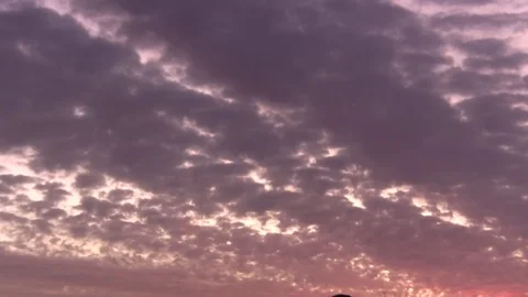 Sunset time lapse of clouds changing color Stock Footage