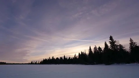 Sunset time lapse with cloudy pink and blue sky Stock Footage 146461682