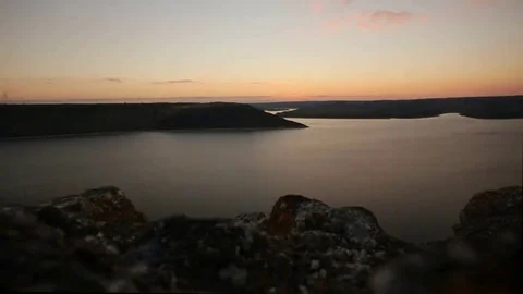 Sunset time lapse from day to night as sun sets below Stock Footage 69147690