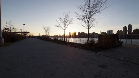 Sunset Time-lapse of the East River and Midtown Manhattan Stock Footage 84327982