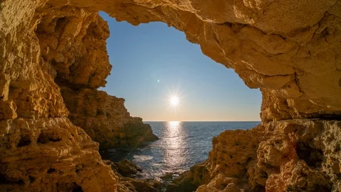 Sunset time lapse on grotto sea. Stock Footage 121411260