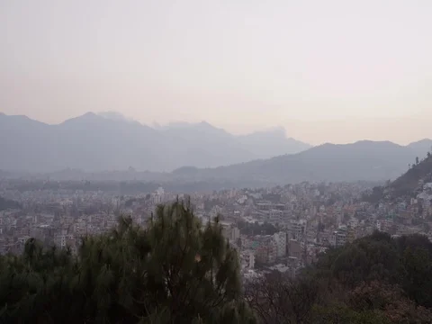 Sunset time lapse of Kathmandu city skyline as seen from Swayambhunath (Monkey Stock Footage 72990694