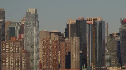 Sunset Time-Lapse of Midtown Manhattan with Moon Rise Boat Traffic &amp; Zoom Out Stock Footage 62528876