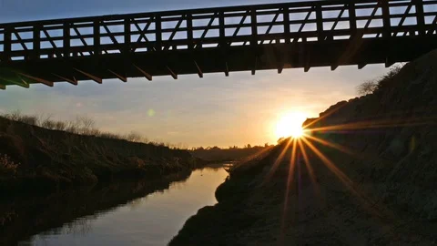 Sunset time lapse near bridge Video stock 99684167