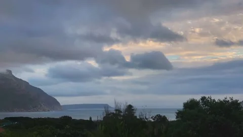 Sunset time lapse over the bay as clouds roll by Stock Footage 154410625
