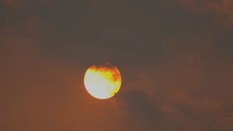Sunset time lapse over hills and on golden sunshine sky background, clear clouds Stockbeeldmateriaal 125936669