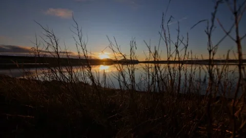 Sunset Time lapse over the Hoy Hills from Stenness near the Standing stones  Video stock 297280451