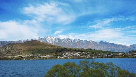Sunset time-lapse over Lake Wakatipu and Queenstown Stock Footage 257873523