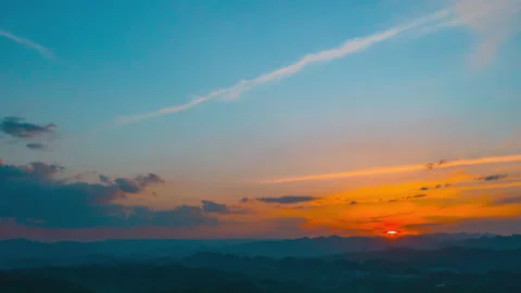 Sunset Time Lapse Over Mountain Peaks Aerial Drone Footage Stock Footage 319978440