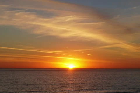 Sunset time lapse over ocean.  Colorful clouds. Stock Footage 194982407