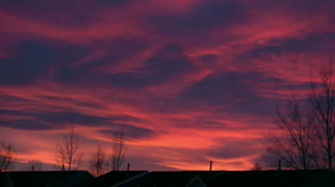 Sunset Time Lapse Over Rooftops 動画素材 566044