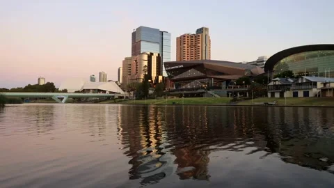 Sunset time lapse panorama of Adelaide cit waterfront across Torrens river 4k. Stock Footage 270919223