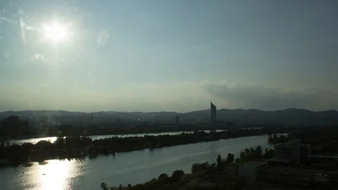 Sunset time lapse  of the river Danube, Millennium Tower, Vienna Austria Stock Footage 98588592