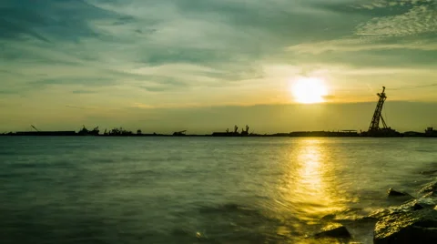 Sunset time lapse at sea with motion sky Stock Footage 65451433