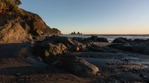 Sunset Time lapse of Sea stacks on the West Coast of New Zealand Stock Footage 135380768
