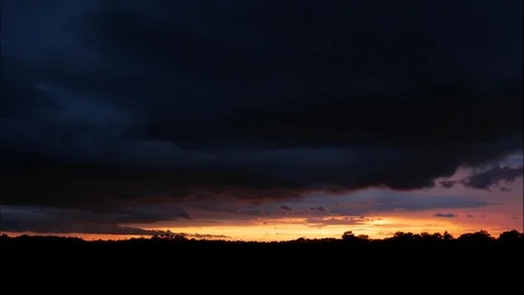 Sunset time lapse speeding from day to night Video stock 95978201