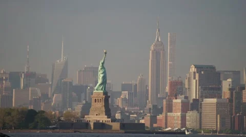 Sunset Time-Lapse of the Statue of Liberty and the Empire State Building Video stock 63636419