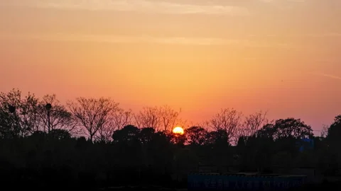 Sunset Time Lapse with Sun Descending Below Horizon 4K Stock Footage 320049518