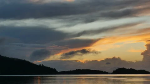 Sunset time lapse with threatening clouds Stock Footage 243700352