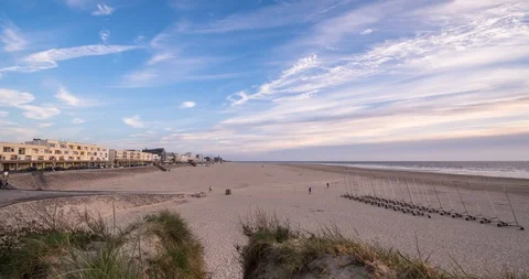 Sunset time-lapse video of huge sand Berck beach and La Manche in May, France Stock Footage 90021298