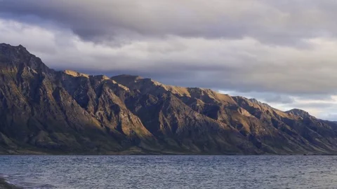 Sunset time lapse view on mountain range around Lake Hawea, New Zealand, Stock Footage 75990478