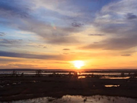 Sunset time lapse on Volga river, beautiful spring landscape with cloudy sky. Stock Footage 75817394