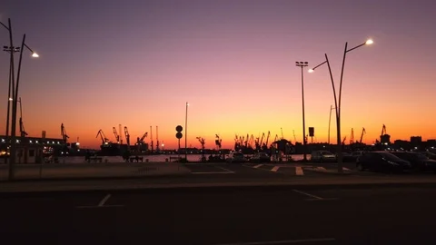 Sunset time at the port. Cityscape at sunset. Video stock 114695046