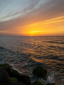 Sunset time at the sea Stock Photos