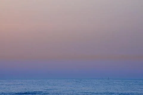 Sunset time at the sea Stock Photos