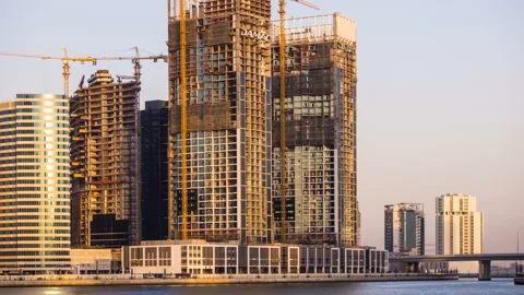 Sunset time Timelapse Business Bay, central business district under construction Video stock 87426626