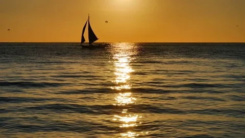 Sunset time UHD shot of the sailing boats Video stock 70739269